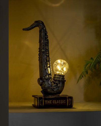 Saxophone Placed On Book Stand