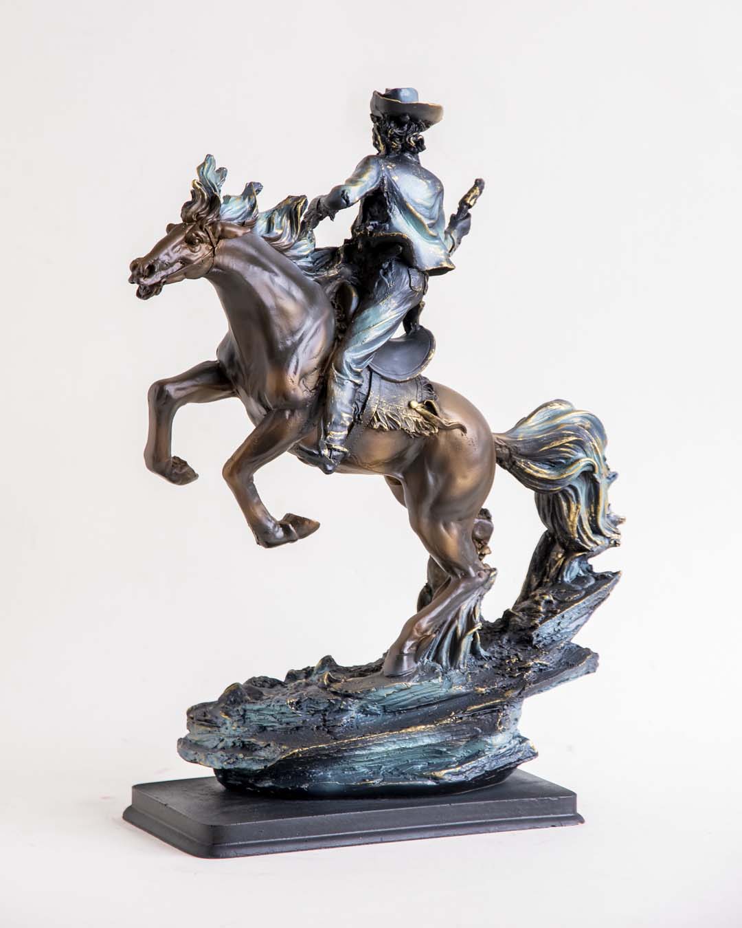 Artisan Cowboy Riding Horse Statue