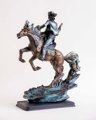 Artisan Cowboy Riding Horse Statue