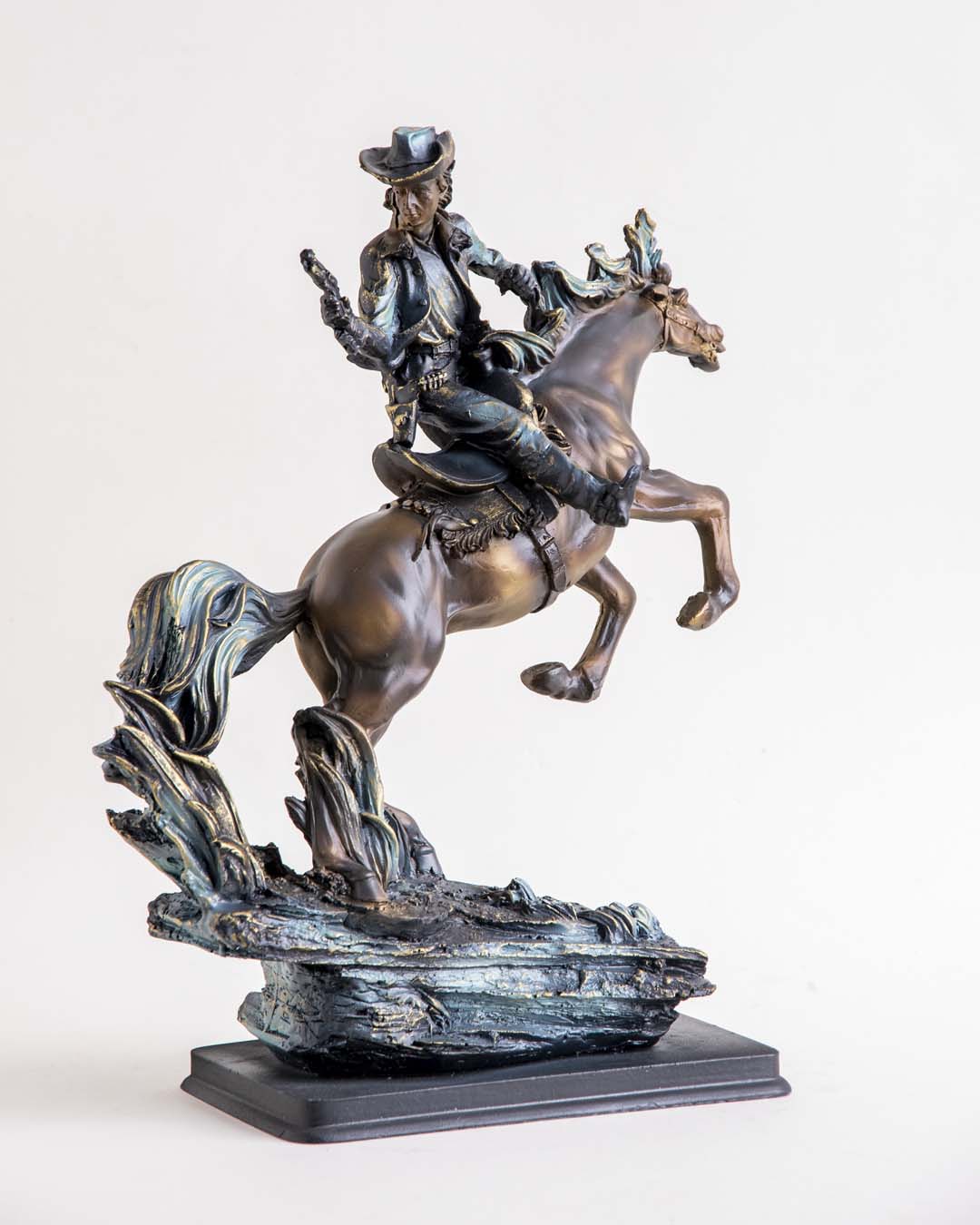Artisan Cowboy Riding Horse Statue