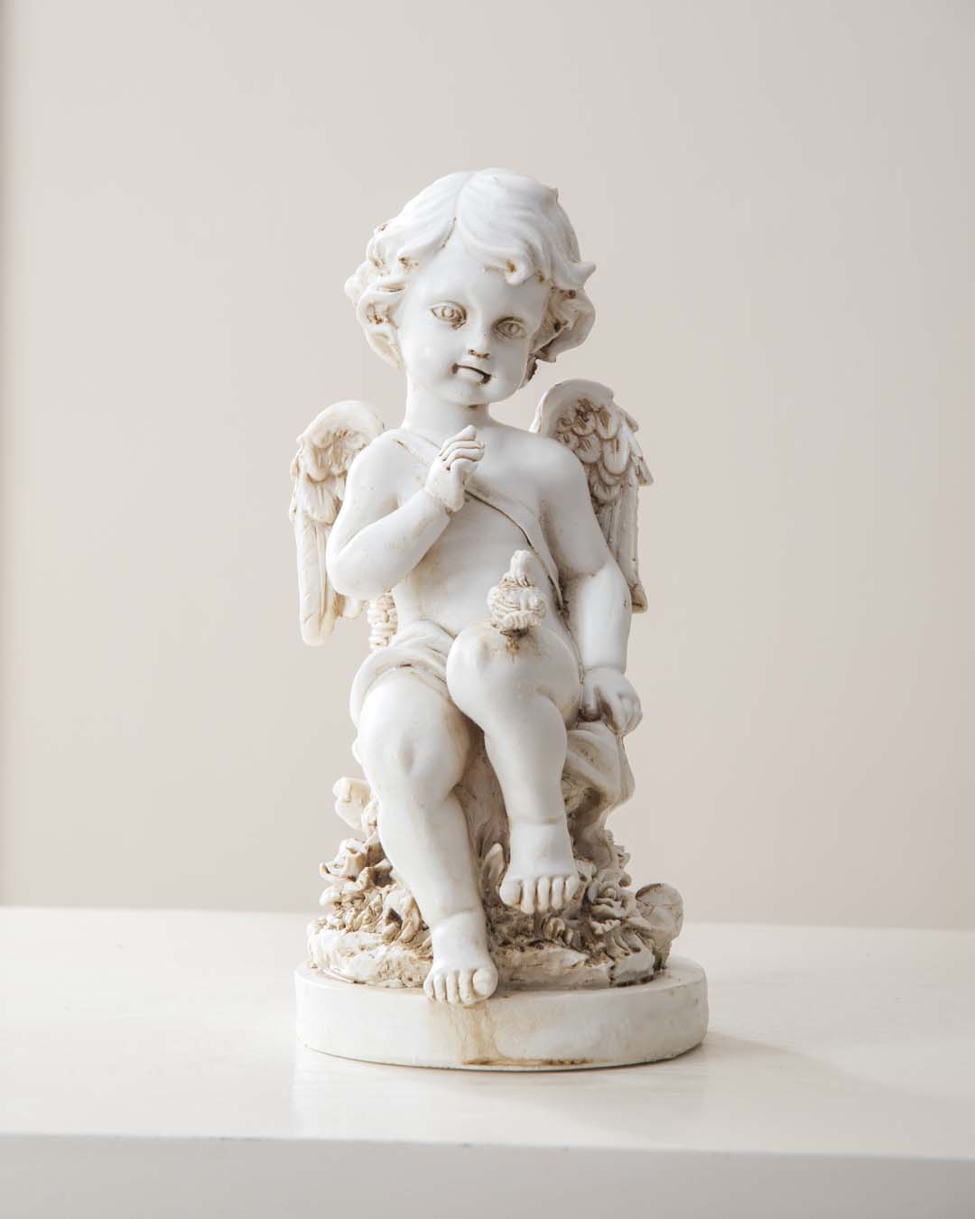 Playing Bird Angel Cherub Figurine